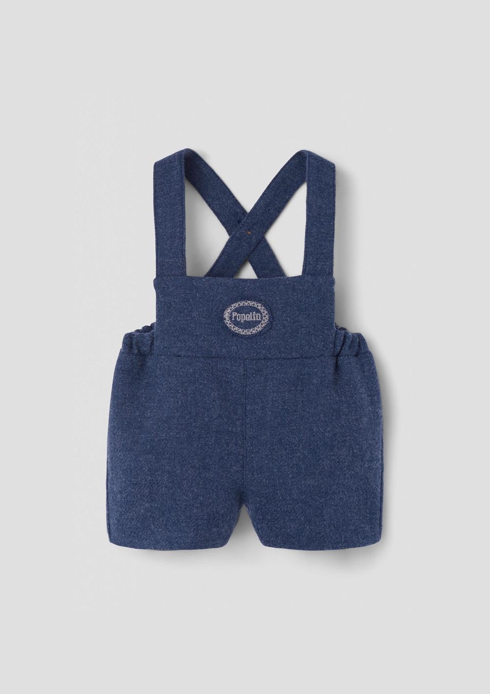 Mod.8.2 Blue woollen short dungarees with embroidery appliqué | AW26.27 Mod.8.2 Blue woollen short dungarees with embroidery appliqué